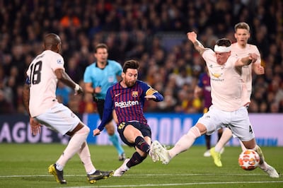 Manchester United, in white, proved no match for Barcelona in the Uefa Champions League quarter-finals. Josep Lago / AFP