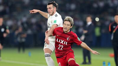 Gareth Bale of Real Madrid and Daigo Nishi of Antlers compete for the ball.