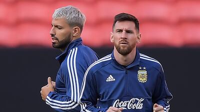 Argentina's Lionel Messi and Sergio Aguerohave won titles for Argentina in age-group football. Carl de Souza / AFP