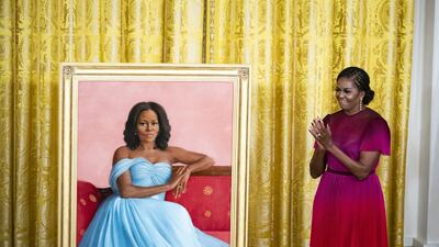 Former US First Lady Michelle Obama stands next to her official White House portrait during an unveiling ceremony in Washington, on September 7. Bloomberg