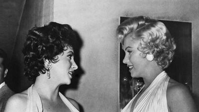 Marilyn Monroe, right, and Lollobrigida in New York in 1954. AFP