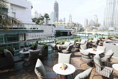 Walnut Grove's terrace offers views of the Dubai Fountain and the Burj Khalifa. Courtesy Walnut Grove