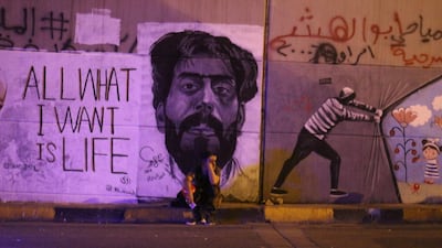 Graffiti art has filled the walls of Tahrir Square in Iraq. Pesha Magid
