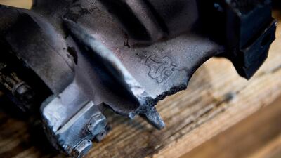 A missile component recovered in Saudi Arabia reveals identity and logo of Iranian manufacturer Shahid Bagger Industries Logo after US ambassador to the UN Nikki Haley unveiled previously classified information intending to prove Iran violated a UN resolution by providing the Houthi rebels in Yemen with arms during a press conference in Washington, DC on December 14, 2017. Jim Watson / AFP