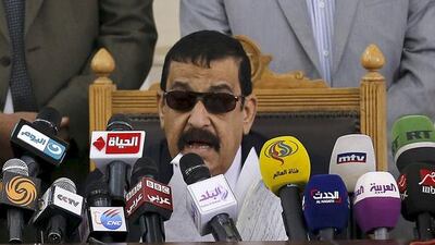 Head of the Giza Criminal Court, Judge Mohammed Nagy Shehata speaks during the trial of Muslim brotherhood leaders in Cairo on April 11. Amr Abdallah Dalsh/Reuters