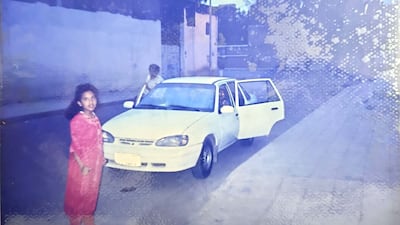 A young Dona outside their home in Sanaa, Yemen. Dona Cheriyan / The National