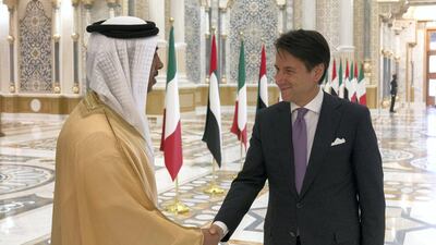 Giuseppe Conte greets Sheikh Mansour bin Zayed, Deputy Prime Minister and Minister of Presidential Affairs, during a reception held at the Presidential Palace. Hamad Al Kaabi / Ministry of Presidential Affairs