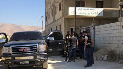 Lebanese security forces gather near the mosque where the shooting took place. Reuters