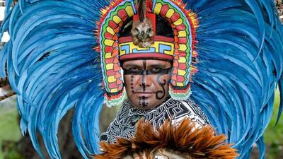 Dancers of Pre-Hispanic traditional dances get ready to set a Guinness Record of “The biggest Ceremonial Dance of the world”, near the Teotihuacan archaeological site, Mexico. Mario Vazquez / AFP