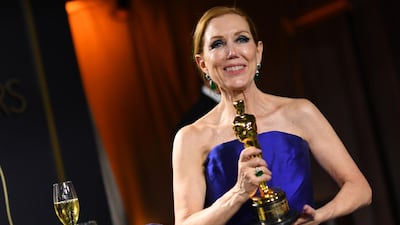 US hair stylist Anne Morgan poses with the Oscar for Best Make-up and Hairstyling for "Bombshell" at the Governors Ball after the Oscars on Sunday, February 9, 2020, at the Dolby Theatre in Los Angeles. AFP