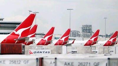 More than 68,000 passengers were left stranded after Qantas on Saturday grounded its entire fleet. Marianna Massey / AFP