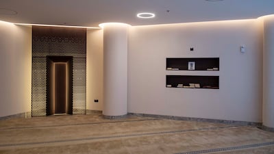 The prayer room in Dubai Design District is fitted with a sleek qibla wall. Antonie Robertson / The National