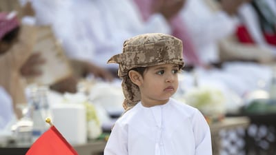 A young guest attends the opening of the Sheikh Zayed Heritage Festival. Mohamed Al Suwaidi / Crown Prince Court - Abu Dhabi