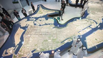 Above, the Abu Dhabi Urban Planning stand at Cityscape Abu Dhabi 2015. ADUPC launched a new strategic plan for 2016-2020, to tie in with the goals of the Abu Dhabi Vision 2030. Mona Al Marzooqi / The National