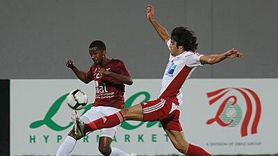 It was an eventful game between Al Wahda, in maroon, and Al Jazira.