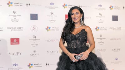 Huda Kattan arrives at the Global Gift Gala red carpet in December 2018. The beauty mogul has been awarded a star on the Dubai Stars walk of fame. Reem Mohammed / The National