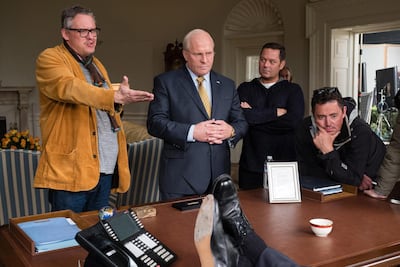 Director Adam McKay on set with Christian Bale, producer Kevin Messick and cinematographer Greig Fraser. Courtesy / Annapurna Pictures