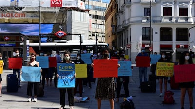 Members of International Amnesty protest to demand the European Union a system to relocated the refugees, on the World Refugee Day in Madrid, Spain, 20 June 2020. World Refugee Day is marked annually on 20 June to raise awareness of the situation of refugees around the world. According to the UNHCR, more and more refugees today live in urban settings outside refugee camps. EPA