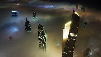 Al Hamra tower, right, in heavy fog over Kuwait City in January. AFP