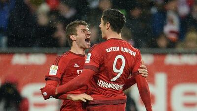 Thomas Muller and Robert Lewandowski of Bayern Munich celebrate a goal against Augsburg in the Bundesliga last weekend. Andreas Gebert / EPA / February 14, 2016