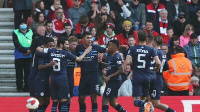 City's Kevin De Bruyne celebrates scoring with teammates. Reuters