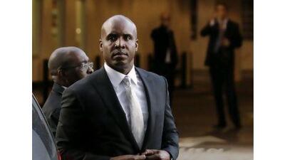 Barry Bonds arrives at the federal courthouse in San Francisco yesterday for the start of his perjury trial. Baseball's all-time home run leader was charged with lying to a federal grand jury when he denied knowingly taking performance-enhancing drugs. Marcio Jose Sanchez / AP Photo