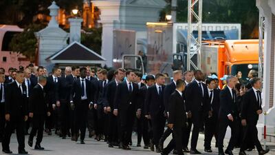 Leicester City's players and staff arrive to pay their respects. EPA