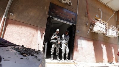 Security forces members at the scene of the tragedy. Reuters