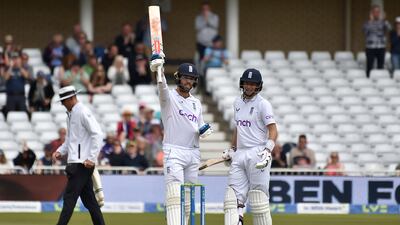 England's Ben Foakes celebrates after reaching his fifty. AP