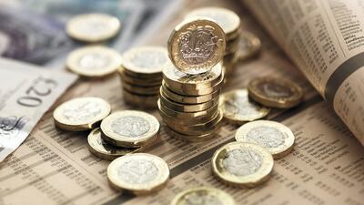 British banknotes and pound coins. Getty Images