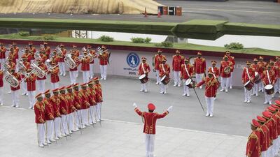 Members of the UAE armed forces marching band perform during the Idex opening ceremony. Mohamed Al Hammadi / Crown Prince Court - Abu Dhabi