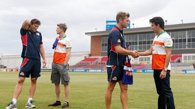 Nico Hulkenberg and Sergio Perez during their meet-and-greet with Aussie Rules footballers Will Minson and Shaun Higgins of Western Bulldogs. Darrian Traynor / Getty Images