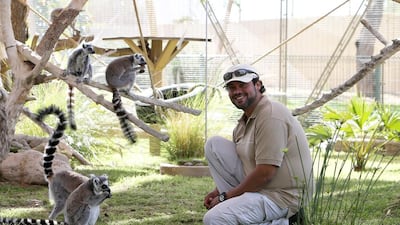 Rashed Al Qemzi was a diplomat in London, but in 2009, he decided to do what he loved, and being around animals brings him serenity. Pawan Singh / The National