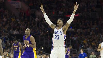 Robert Covington of the Philadelphia 76ers reacts in front of Kobe Bryant of the Los Angeles Lakers during their NBA contest on Tuesday. Mitchell Leff / Getty Images / AFP / December 1, 2015