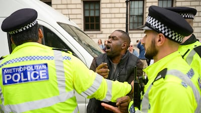 A driver clashes with police in Parliament Square. Getty Images