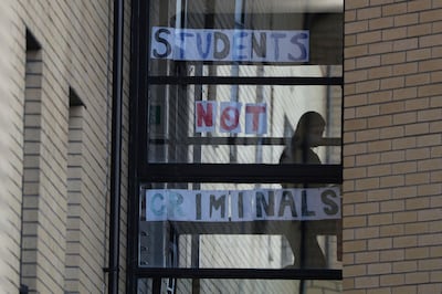 Students across the UK are calling for their tuition fees to be refunded. AP