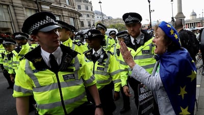 A woman argues with police during an anti-Brexit protest in London, Britain August 31, 2019. REUTERS/Kevin Coombs
