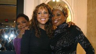 Mariah Carey, with Oprah Winfrey and singer Mary J. Blige, at a news conference for Precious: Based on the Novel Push by Sapphire during the 34th Toronto International Film Festival on September 13, 2009.