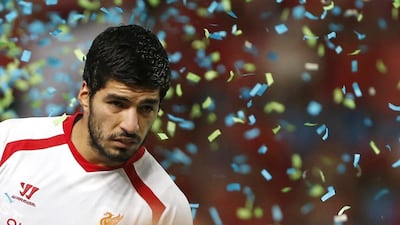 Luis Suarez will play his first game of the new season after a controversial 2012/13. Rungroj Yongrit / EPA