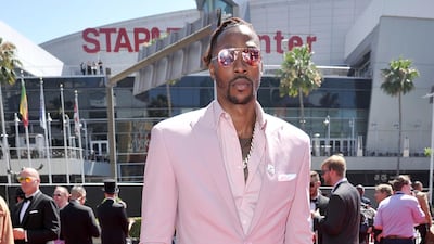 NBA player Dwight Howard, of the Memphis Grizzlies, arrives at the Espy Awards on Wednesday, July 10, 2019, at the Microsoft Theatre in Los Angeles. AP