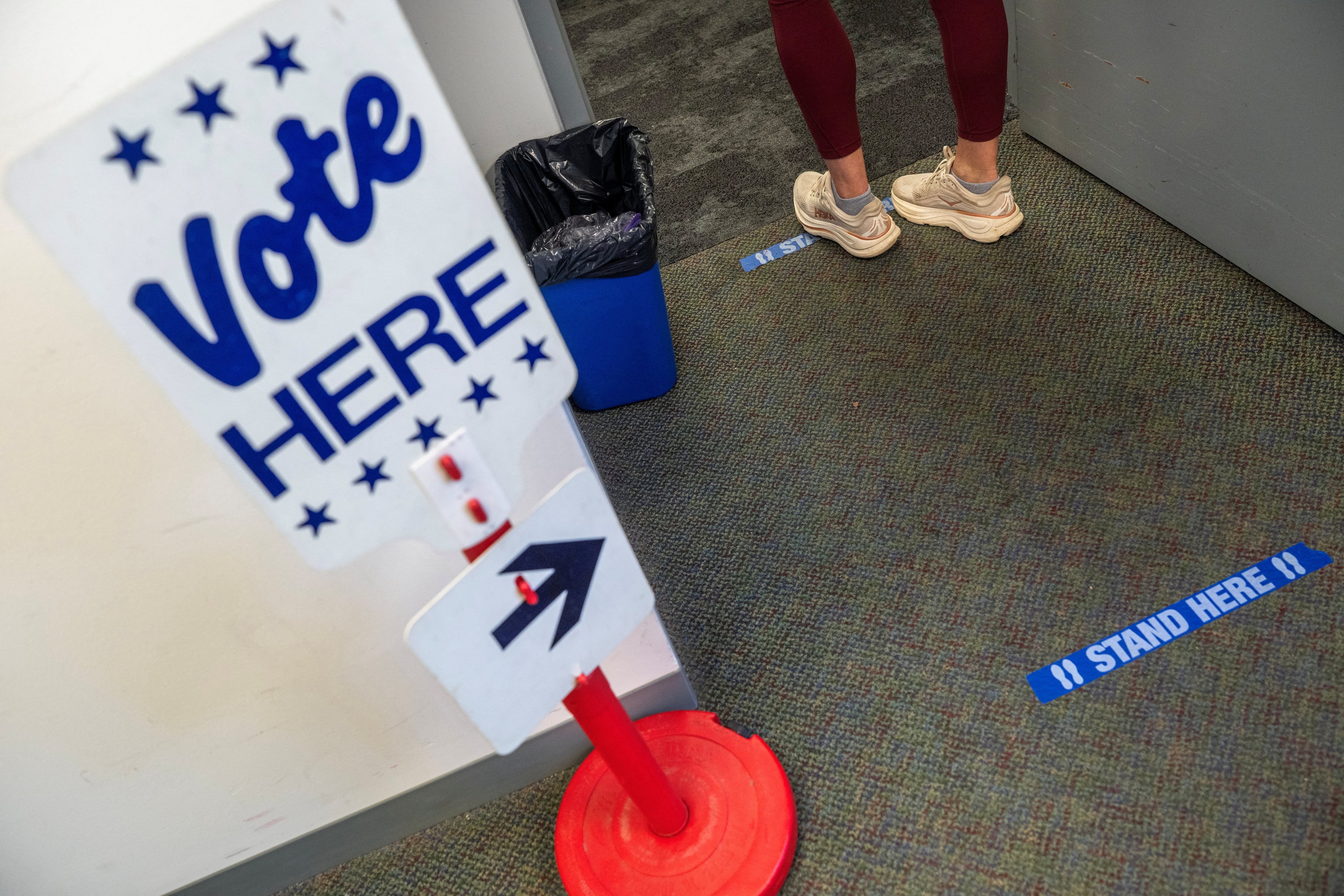 A sign during early voting at the Alexandria City Registrar Office in Alexandria, Virginia, on October 7. Reuters