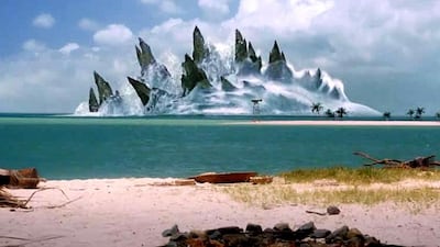 Godzilla emerges from the sea in the 2014 movie. Courtesy Warner Bros.