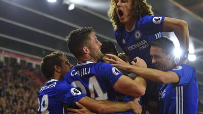 Chelsea defender David Luiz, here celebrating a goal against Southampton last week, has been among the benefactor's of manager Antonio Conte's tactical switch to three defensive backs. Glyn Kirk / AFP