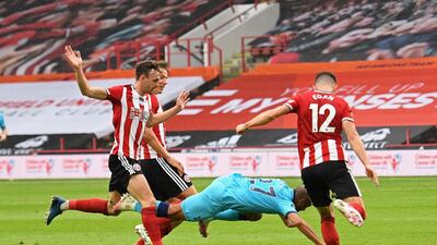 Tottenham's Brazilian Lucas Moura goes down and accidentally handles the ball in the build-up to Harry Kane scoring, but the goal was overturned by VAR. AFP
