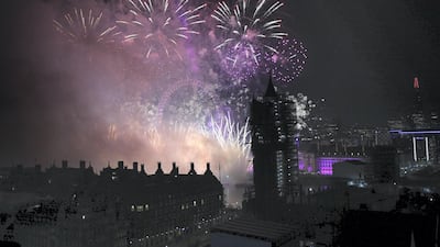Fireworks explode over London Eye to ring in the New Year on January 1, 2020. Getty Images