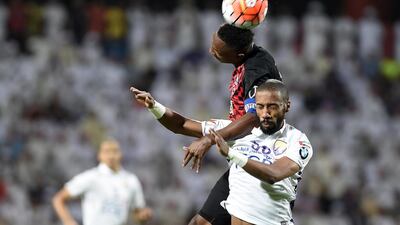 Ahmed Khalil, in red and black, was the matchwinner for Al Ahli against Al Ain.