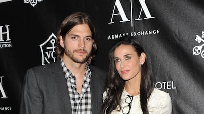 8.Ashton Kutcher and Demi Moore. (Photo by Stephen Lovekin / GETTY IMAGES NORTH AMERICA / Getty Images via AFP)