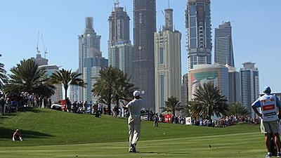 The world's leading golfers continue to come to play in Dubai, including Tiger Woods, seen here playing a shot at the eighth hole during the third round of the Dubai Desert Classic golf tournament at the Emirates Golf Club.