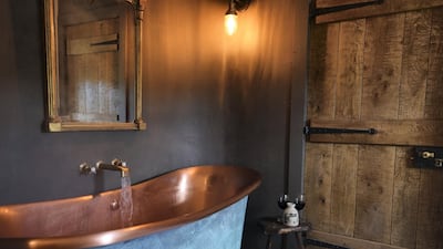An inviting traditional copper bathtub. Courtesy Kilmartin Castle