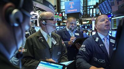 Traders and financial professionals work on the floor of the New York Stock Exchange. Getty Images